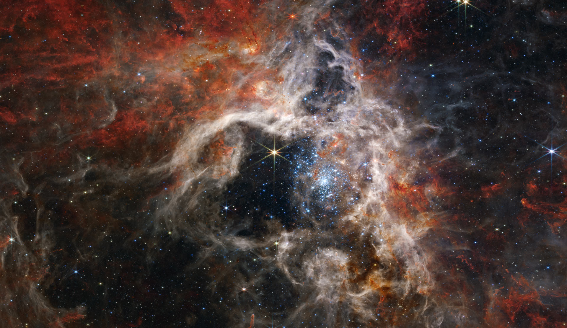 Телескоп Джеймс Уэбб изучает туманность Тарантул 