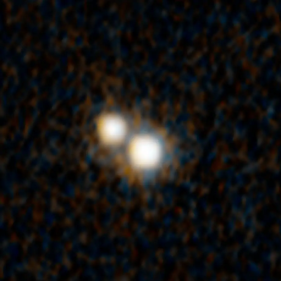 Фотография пары квазаров, сделанная космическим телескопом Хаббл