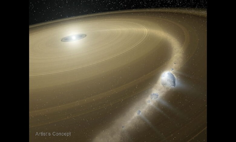 Обломки захваченного объекта, похожего на Плутон, падают на белый карлик.